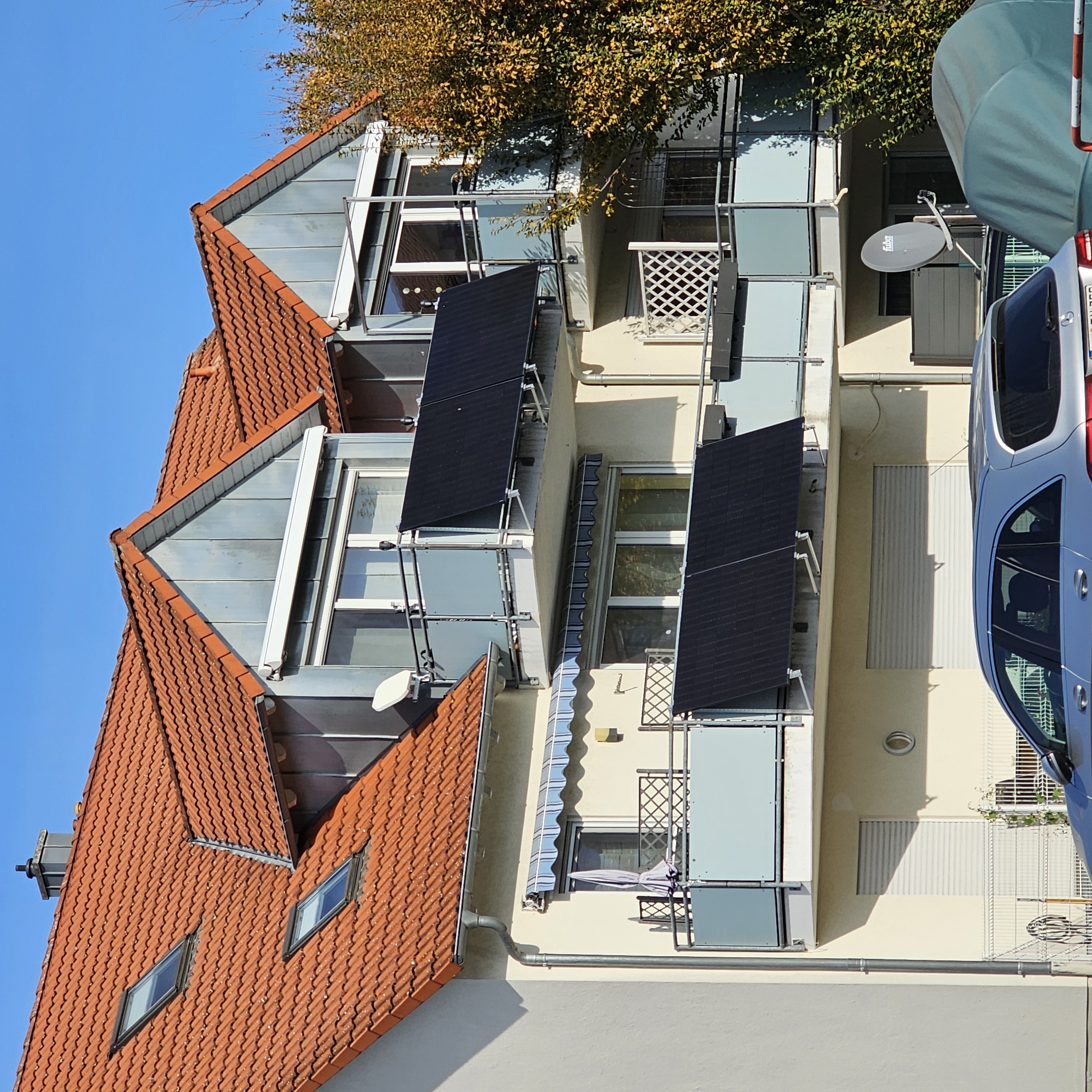 400W solar panel mounted on apartment balcony railing